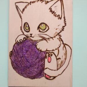 Chaton avec une pelote de laine